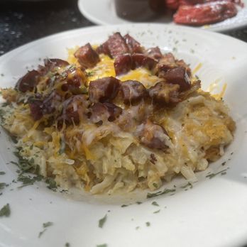 The Cenacle Bistro - Hash brown bowl with beef sausage and red velvet waffles *chef kiss* - Coffee & Tea Near Me - Austell, Georgia The Cenacle Bistro - Hash brown bowl with beef sausage and red velvet waffles *chef kiss* - Coffee & Tea Near Me - Austell, Georgia