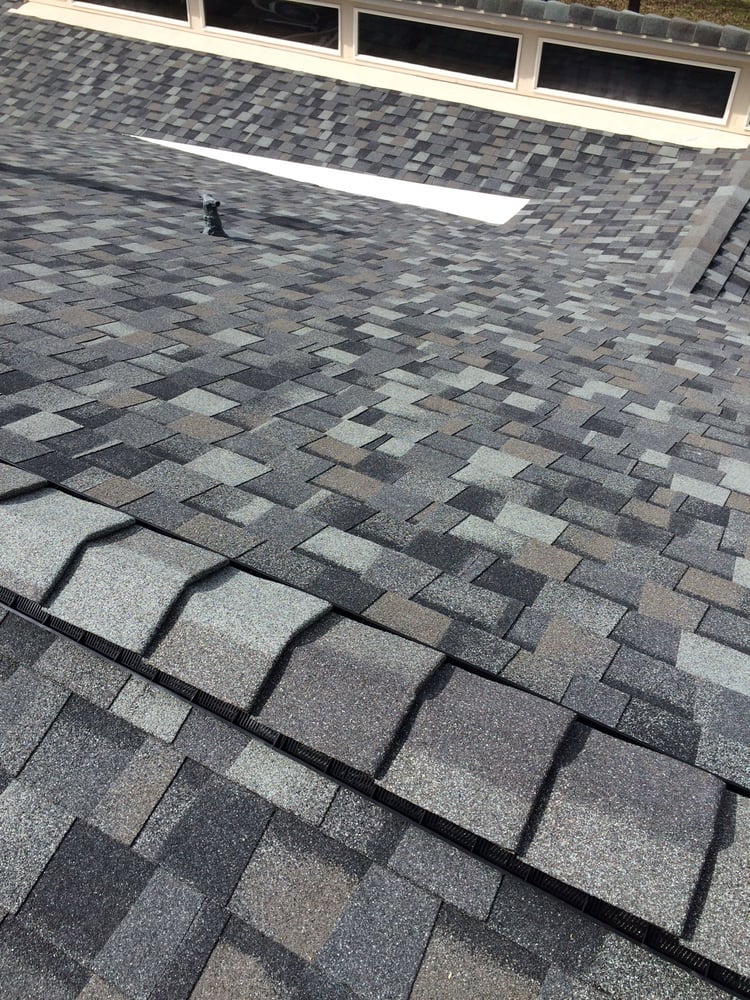 Slide of Kelly Roofing