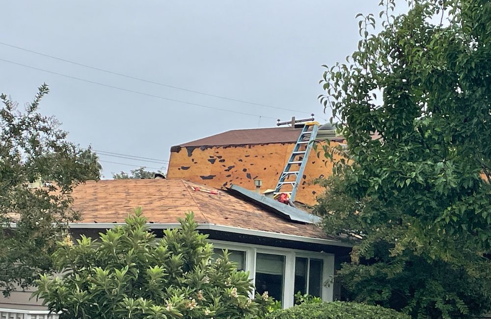 Slide of Apache Roofing