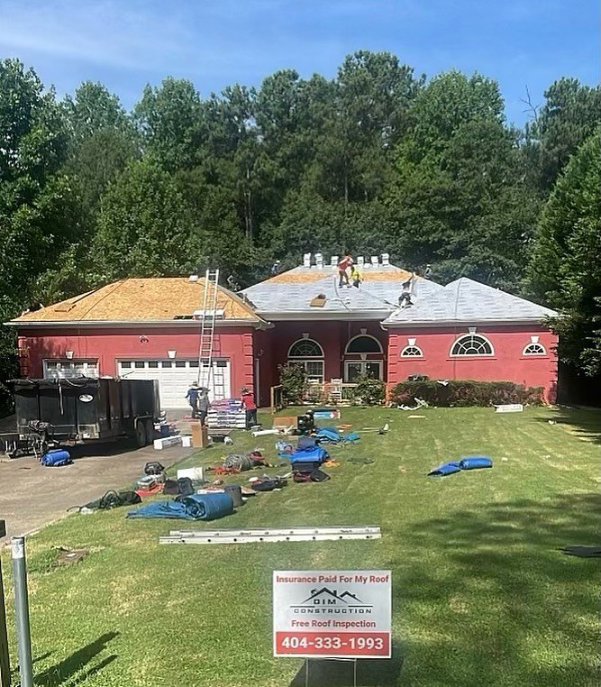 Slide of DIM Construction and Roofing