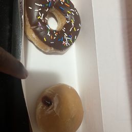 Chocolate sprinkles and raspberry stuffed i forgot to take a picture of the 4 dozen glazed ones Chocolate sprinkles and raspberry stuffed i forgot to take a picture of the 4 dozen glazed ones