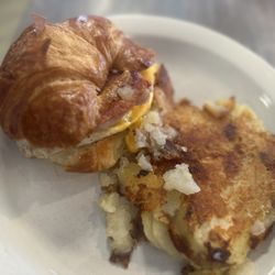 The Crows Nest Diner - Croissant Breakfast Sandwich w/ Fried Potatoes
