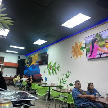 Juancho’s Grill & Bar - people sitting at tables - Colombian Near Me - San Jose, California Juancho’s Grill & Bar - people sitting at tables - Colombian Near Me - San Jose, California