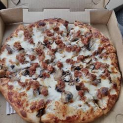 Pizza Plus - Sausage and mushroom pizza with white sauce ! My absolute favorite. Had it many times.