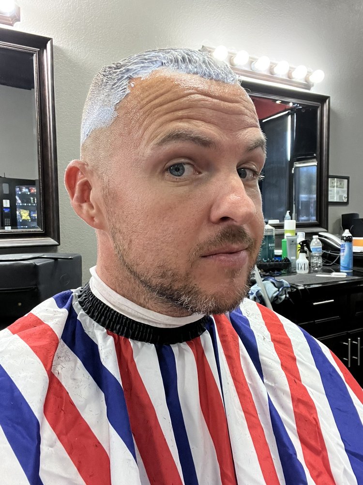 Red The Barber Logo
