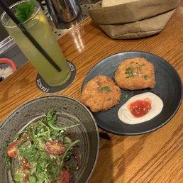 Avocado salad, fritters, pita bread, limonada