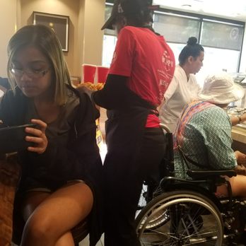 Panda Express - Unique carrying a customer's tray to the table area. - Chinese Near Me - New York, New York