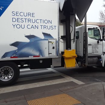 Iron Mountain - Oakland - Iron Mountain truck parked across pedestrian crosswalk on Lake shore Ave Oakland - Data Recovery Near Me - Oakland, California