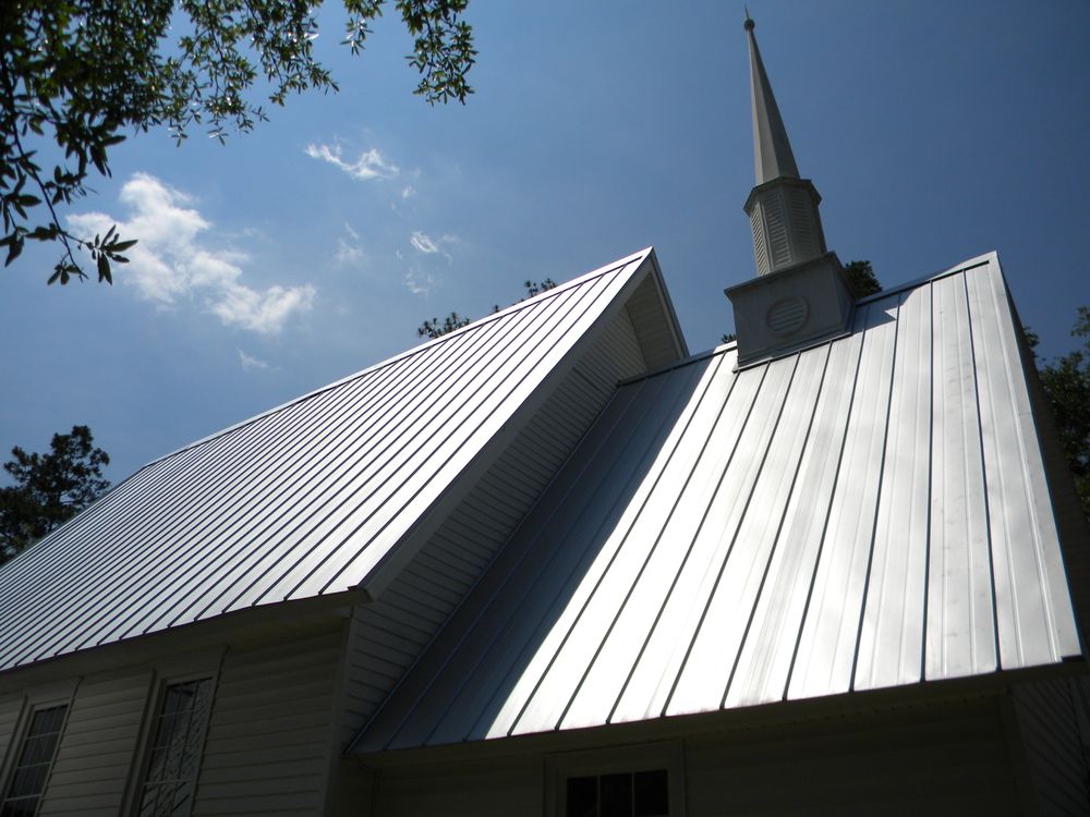 Slide of Tadlock Roofing