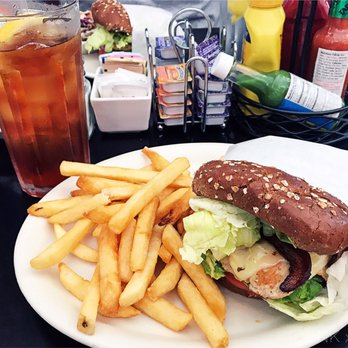 Russell's - Avocado Bacon Swiss Chicken Club Sandwich, French Fries, and Brewed Iced Tea - American Near Me - Pasadena, California