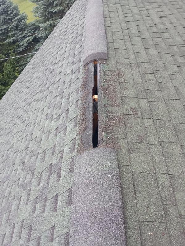 Slide of All Slopes Roofing