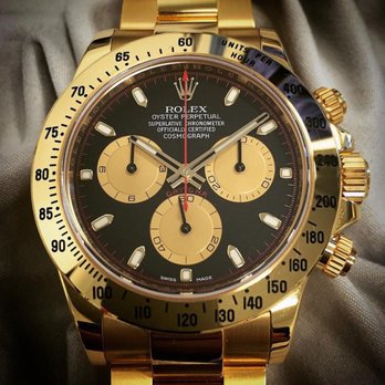 Finley's Jewelers - Solid 18 karat yellow gold 2016 Rolex Daytona with the special black and red Paul Newman dial - Jewelry Near Me - Redondo Beach, California Finley's Jewelers - Solid 18 karat yellow gold 2016 Rolex Daytona with the special black and red Paul Newman dial - Jewelry Near Me - Redondo Beach, California