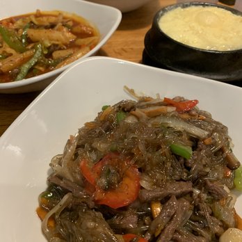 Korea House - Japchae (front), tteokbokki (left), steamed egg (right), bulgogi (back) - Korean Near Me - Cleveland, Ohio Korea House - Japchae (front), tteokbokki (left), steamed egg (right), bulgogi (back) - Korean Near Me - Cleveland, Ohio