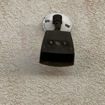 Southern Utah Electric - Old, broken floodlight with sub substandard wiring. - Electricians Near Me - St. George, Utah Southern Utah Electric - Old, broken floodlight with sub substandard wiring. - Electricians Near Me - St. George, Utah