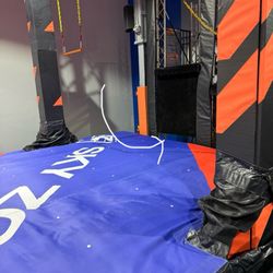Sky Zone Trampoline Park - Gap in equipment - my son fell through this onto the ground underneath the platform.