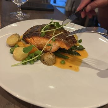Sassafraz - Salmon served with a chunk out of it. Other pieces were whole, this was served for 2 of us to share. - French Near Me - Toronto, Ontario Sassafraz - Salmon served with a chunk out of it. Other pieces were whole, this was served for 2 of us to share. - French Near Me - Toronto, Ontario