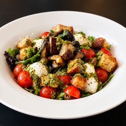 Meridionale - Buffalo Mozzarella salad with eggplant, cherry tomatoes, black olives, basil pesto, and bread croutons