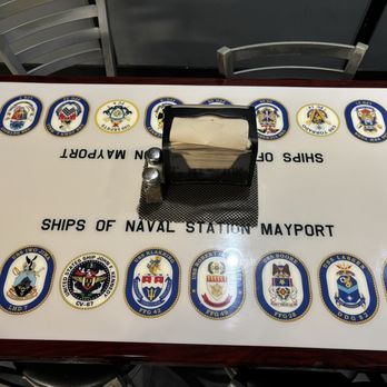 The Hangar Bay Cafe & Gallery - Table honoring ships at Mayport - New American Near Me - Atlantic Beach, Florida The Hangar Bay Cafe & Gallery - Table honoring ships at Mayport - New American Near Me - Atlantic Beach, Florida