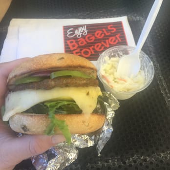 Bagels Forever - Egg cheese and sausage breakfast sandwich on a jalapeño cornmeal bagel - Bagels Near Me - Madison, Wisconsin Bagels Forever - Egg cheese and sausage breakfast sandwich on a jalapeño cornmeal bagel - Bagels Near Me - Madison, Wisconsin