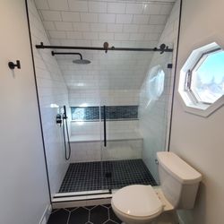 New Life Construction - We remodeled this bathroom, including the custom tile shower.
