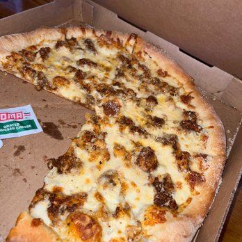 The Loaded Barrel Tavern - a half eaten pizza - Bars Near Me - Bradenton, Florida