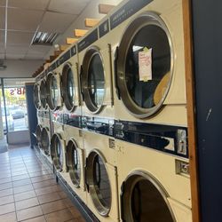 Econo Wash - Place is a mess  so expensive for everything to be broken and dirty and nasty soap buildup on top of the washers