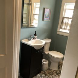 a bathroom with a sink and toilet