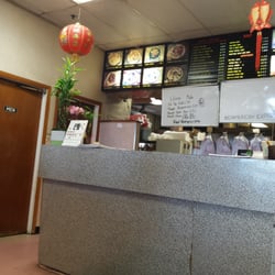 Peking Garden Restaurant - Lots of eat in customers, nice American speaking girl...waiting on my Happy Family
