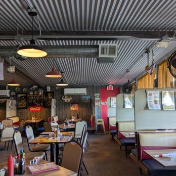 TJ's Homestyle Restaurant - West dining area, highlighting classic style booths and a very small selection of the varied decorations, creating a comforting atmosphere. - American Near Me - Avondale, Arizona TJ's Homestyle Restaurant - West dining area, highlighting classic style booths and a very small selection of the varied decorations, creating a comforting atmosphere. - American Near Me - Avondale, Arizona