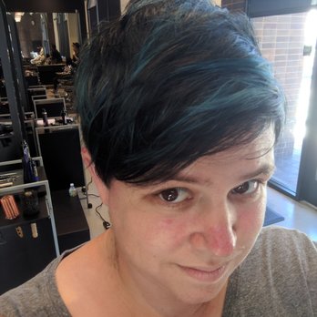 Oro Y Vida - Teal on a black base. - Hair Stylists Near Me