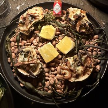 Manifest - Oysters in the half shell Rockefeller style - Barbers Near Me - Washington, DC, District of Columbia