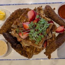 Chicken n' Waffles (GF, DFO) Plaintain Crusted Chicken Tenders + Paleo Belgian Waffle + Honey Dijon Sauce + Maple Syrup + Grass-fed Butter Chicken n' Waffles (GF, DFO) Plaintain Crusted Chicken Tenders + Paleo Belgian Waffle + Honey Dijon Sauce + Maple Syrup + Grass-fed Butter