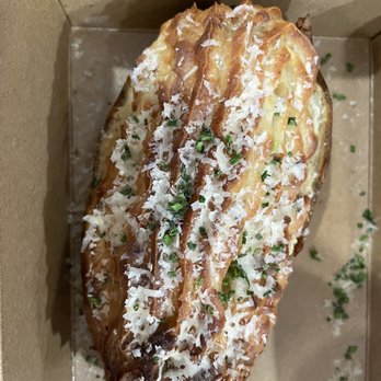 John Howie Steak Restaurant - Five Cheese Twice Baked Stuffed Potato - Steakhouses Near Me - Bellevue, Washington John Howie Steak Restaurant - Five Cheese Twice Baked Stuffed Potato - Steakhouses Near Me - Bellevue, Washington