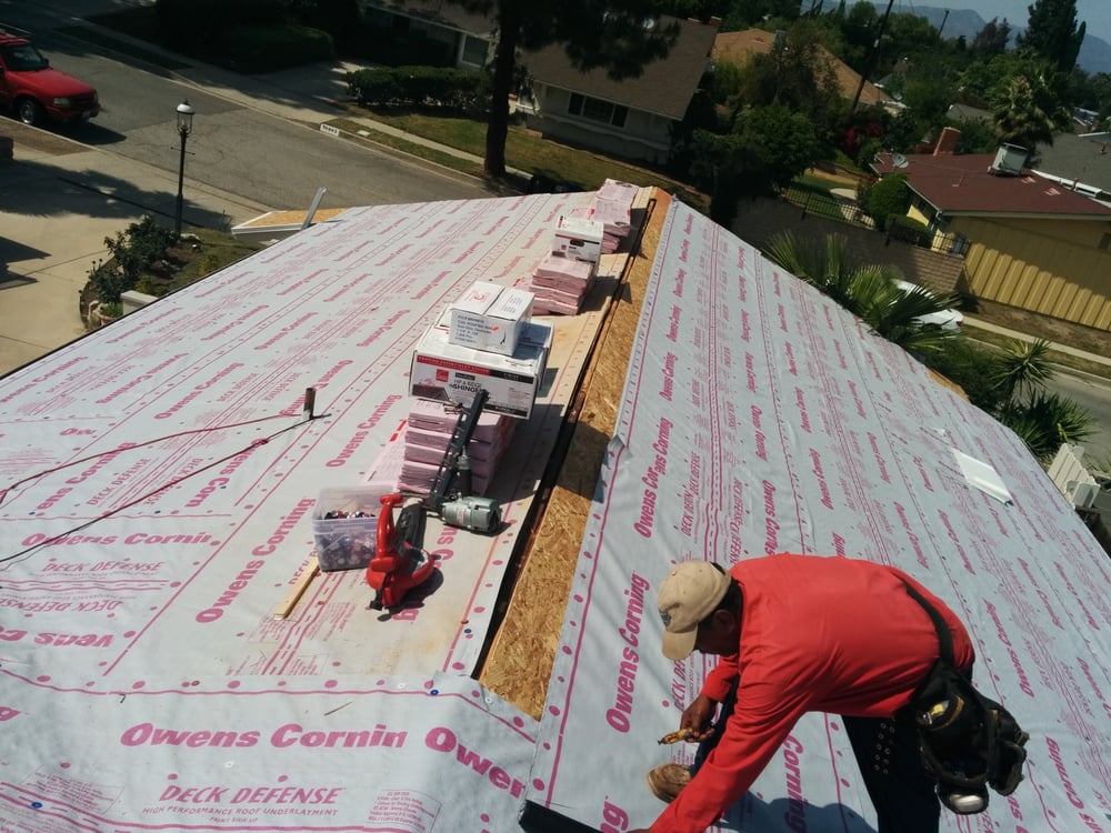 Slide of Mike's Roofing & Building