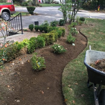 Greenwave Landscape Design Services - a wheelbarrow garden - Landscaping Near Me Greenwave Landscape Design Services - a wheelbarrow garden - Landscaping Near Me