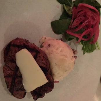 CHOP - Filet with the butter topping and a side of mashed baby reds - Steakhouses Near Me - Sister Bay, Wisconsin
