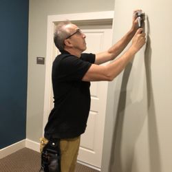 Simply Change - Professional Organizers - Beautifying! We are excellent at hanging peoples' art to make a house a home.