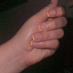 Salon & Spa De Crist - White spots on the French tip and color bleeding into the nail bed. The picture doesn't do justice as to how bad of a job this was.