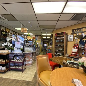 The Java Tree - Roasters, Cafe, and Bakery - The decor is beautiful. Full of tea cups and pots! - Coffee Roasteries Near Me - Las Vegas, Nevada The Java Tree - Roasters, Cafe, and Bakery - The decor is beautiful. Full of tea cups and pots! - Coffee Roasteries Near Me - Las Vegas, Nevada