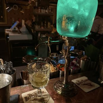 The Blind Rabbit - C.F. Berger Absinthe with sugar cube and water dispenser. - Cocktail Bars Near Me - Anaheim, California