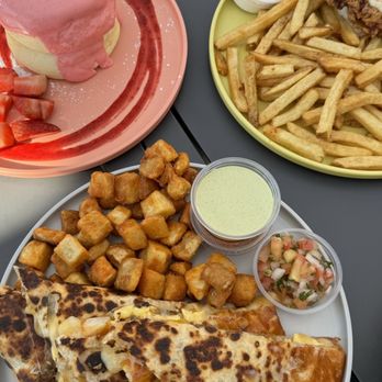 Burnt Crumbs - Strawberry Souffl Pancakes, breakfast quesadilla, Fried Chicken Sandwich - New American Near Me - Irvine, California