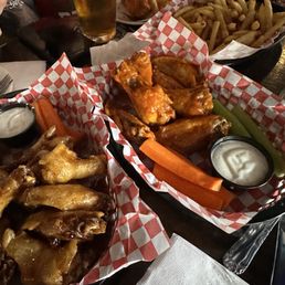 Beers, chicken wings, and fries Beers, chicken wings, and fries