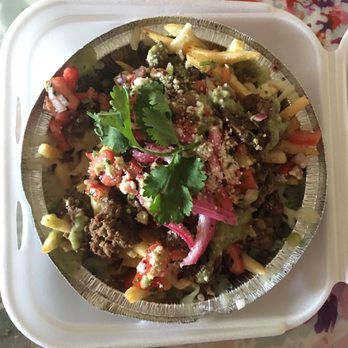 MAIZ Cocina - Asada Fries - crunchy was huge chunk of steak on top and beans underneath - Food Trucks Near Me - Corona, California MAIZ Cocina - Asada Fries - crunchy was huge chunk of steak on top and beans underneath - Food Trucks Near Me - Corona, California