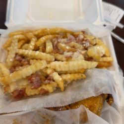 Wing Express Deli - 10 wings with all flats and cheese and bacon fries They are so crispy while having such a good tender flavor