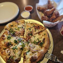 Village Pizza - BBQ Chicken pizza with hot wings