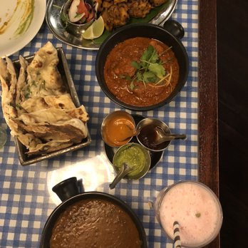 Dishoom - Chicken tikka, black dhal, chicken curry. Rose lassi, garlic naan. - Indian Near Me - London, XGL Dishoom - Chicken tikka, black dhal, chicken curry. Rose lassi, garlic naan. - Indian Near Me - London, XGL