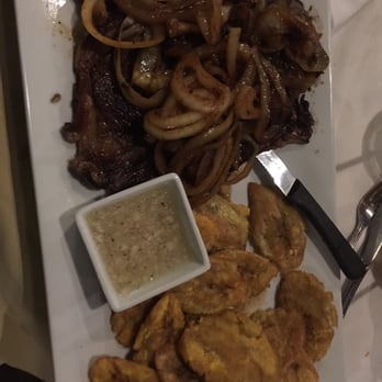 Casa Del Campo - Bistec encabollado (onion steak) with fried plantains - Dominican Near Me - North Babylon, New York Casa Del Campo - Bistec encabollado (onion steak) with fried plantains - Dominican Near Me - North Babylon, New York
