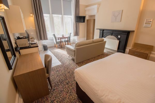 Embassy Apartments Glasgow - Book Direct for Best Rates. We're cheaper than online travel agents. by null