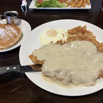 Eddie's Diner - CFS Breakfast. Chicken fried steak, eggs, hash browns and pancakes. - Breakfast & Brunch Near Me - Plano, Texas Eddie's Diner - CFS Breakfast. Chicken fried steak, eggs, hash browns and pancakes. - Breakfast & Brunch Near Me - Plano, Texas