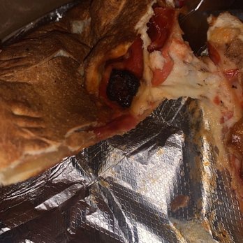 Famous Pizza - Burnt - Pizza Near Me - Rio Linda, California Famous Pizza - Burnt - Pizza Near Me - Rio Linda, California